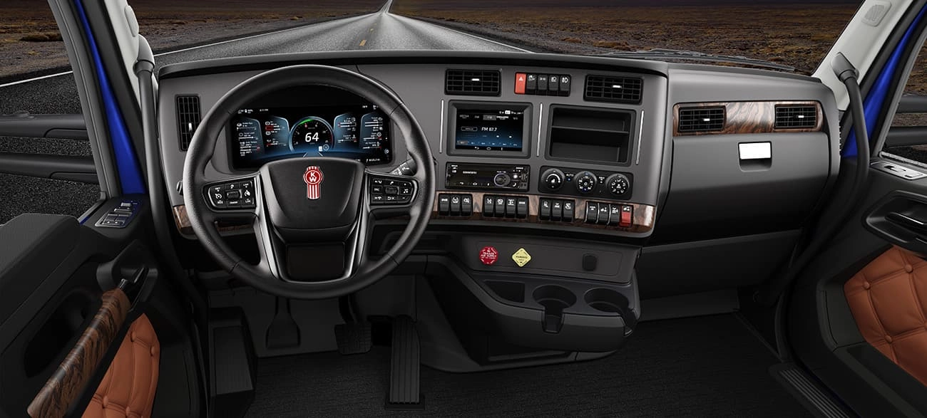 Kenworth T680 Next Gen cab interior showing the digital driver display and steering wheel