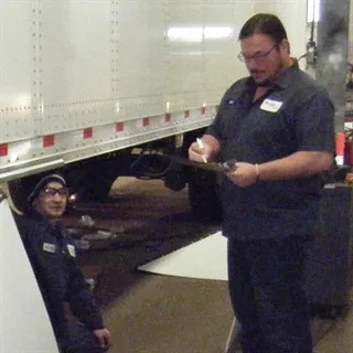 Wallwork Center Trailer repair workers