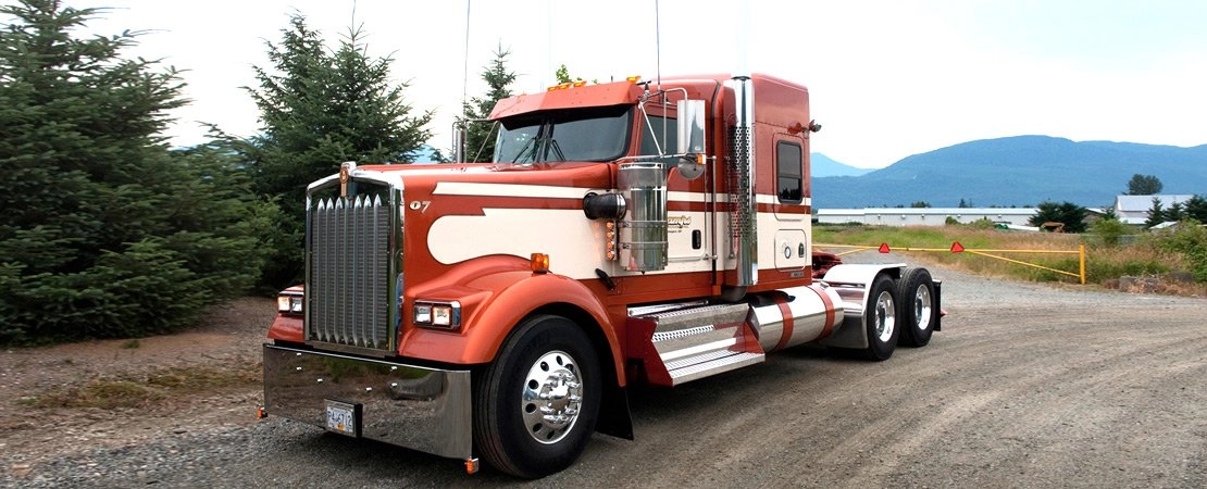 kenworth performance truck near the trees