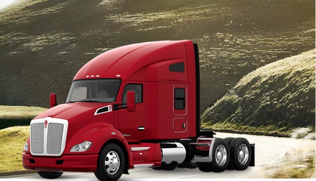 Red Kenworth T680 with mountains on the background
